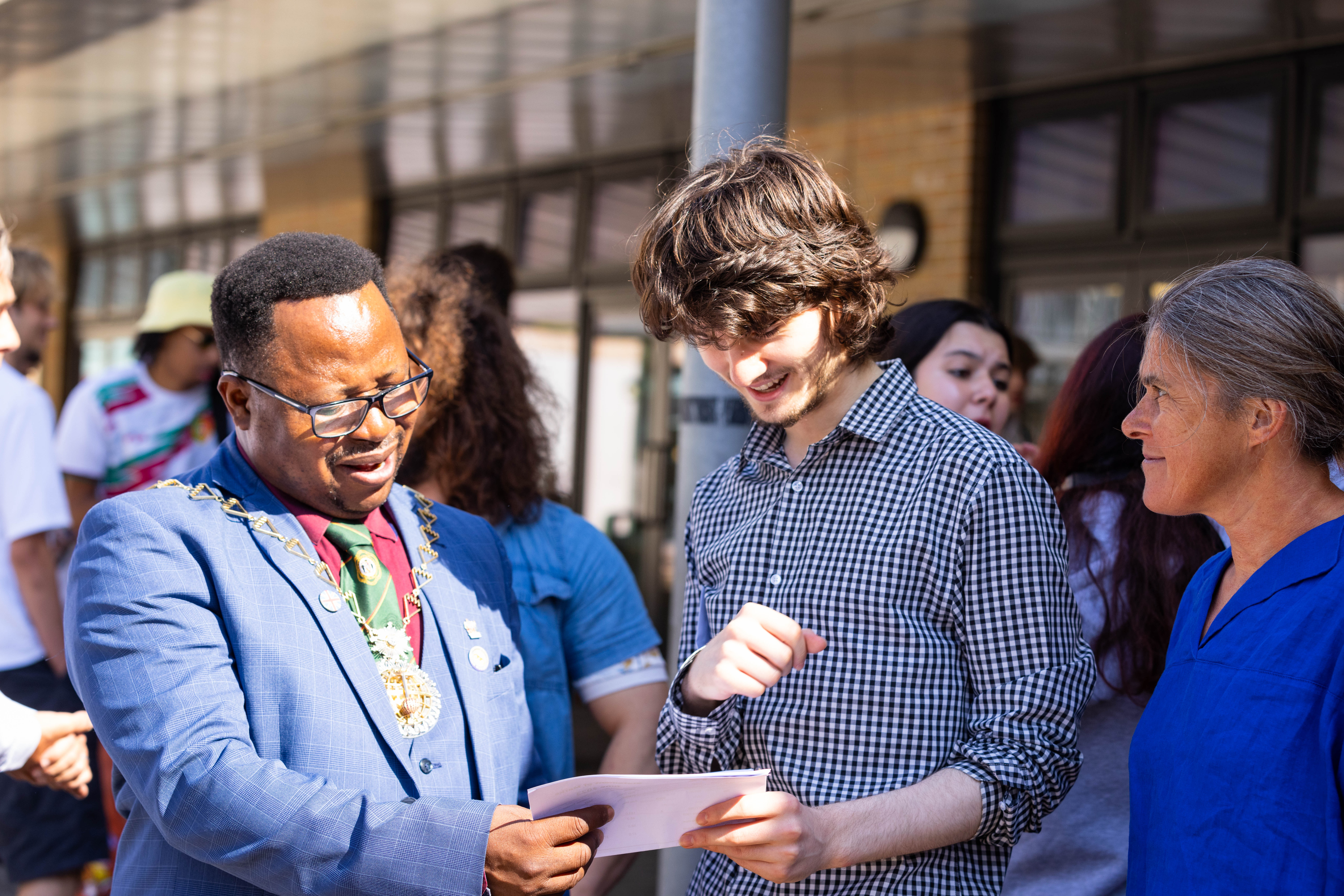 Cllr Mbang with a Thomas Tallis student