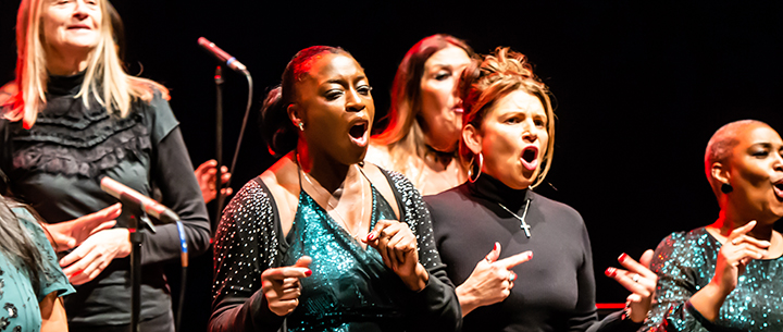 People in a choir singing