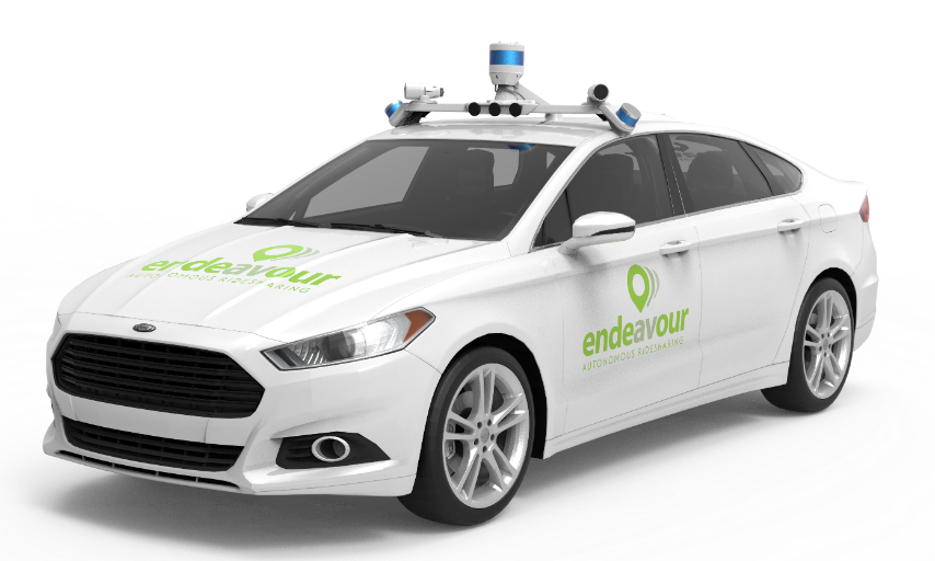 Picture of the white Endeavour autonomous ride-sharing service vehicle. The vehicle has a green Endeavour logo on the front and side of the car.
