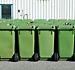 Row of green wheelie bins