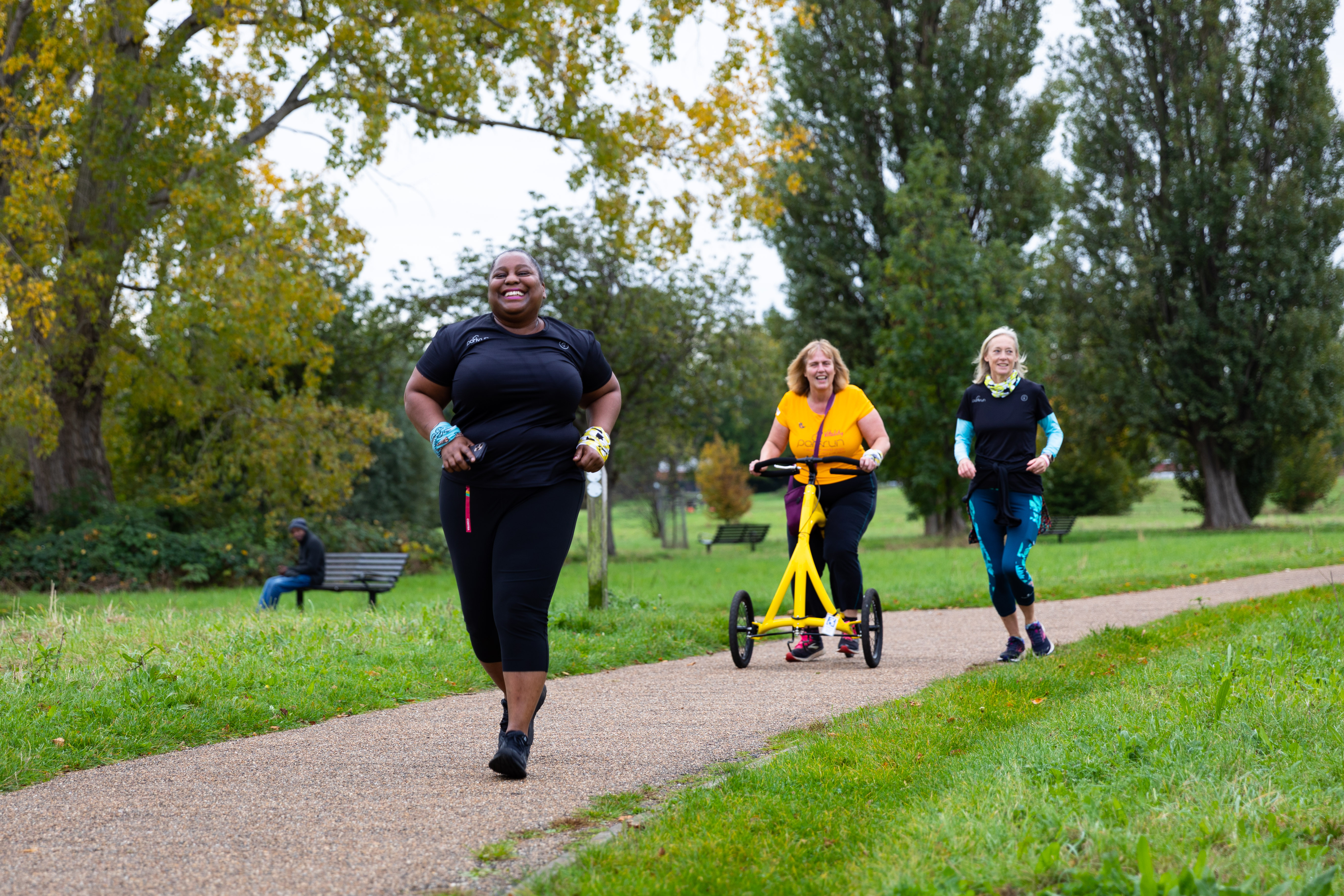 Three ladies running in Sutcliffe Park