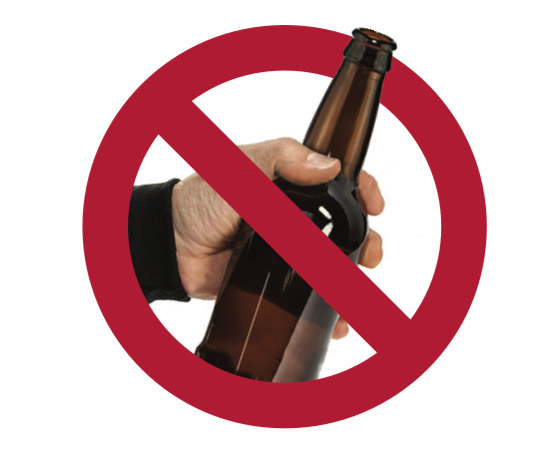 Image of a hand holding alcohol bottle with a red crossed out circle in front of it.