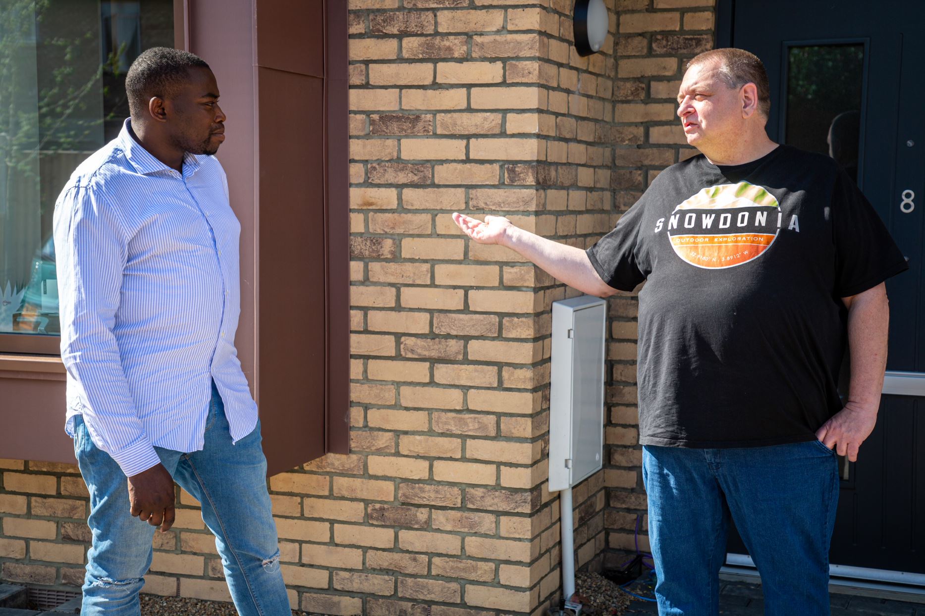 Cllr Okereke with Kyle Mews tenant Doug.