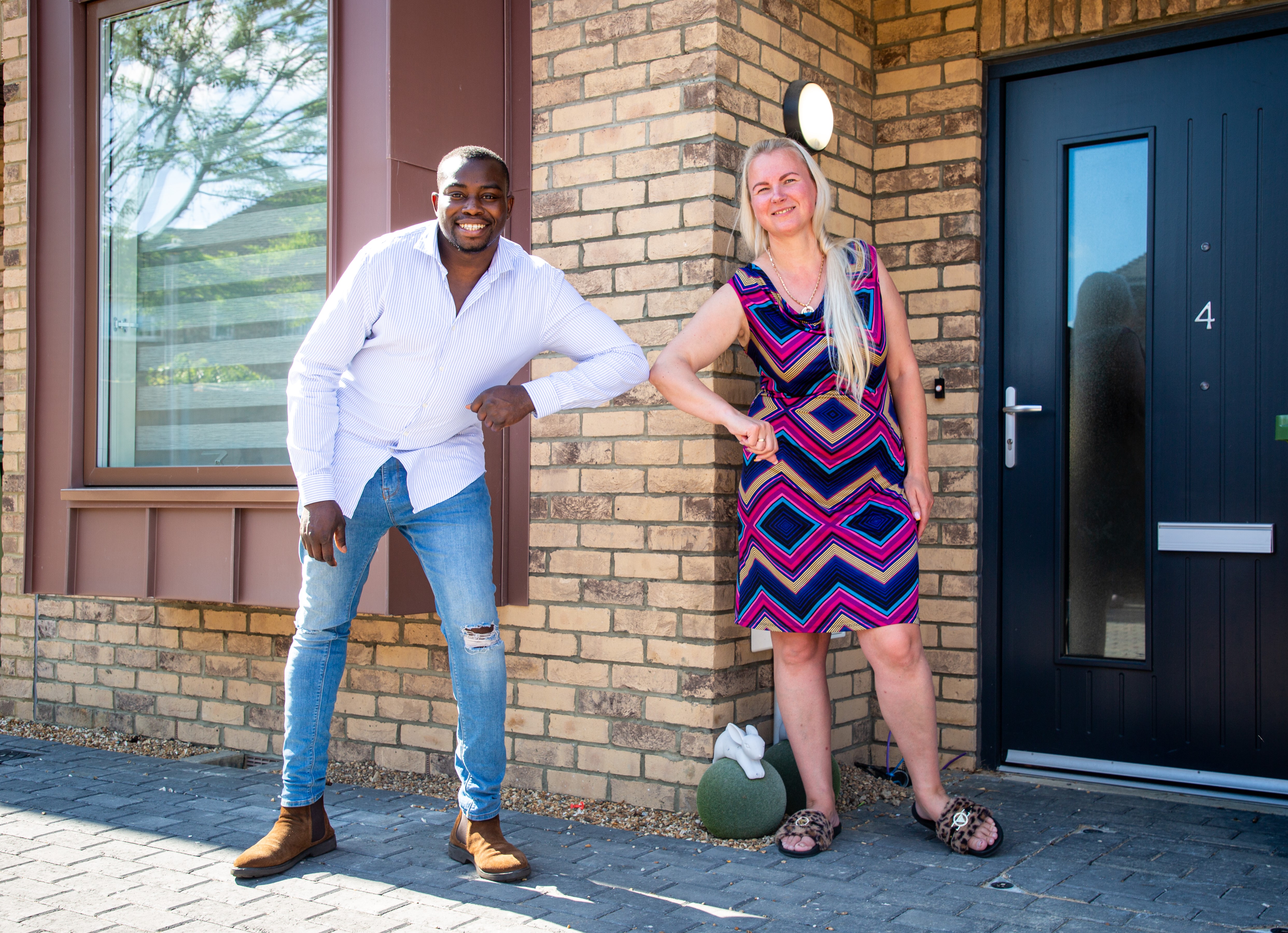 Cllr Anthony Okereke with new tenant Jurgita.