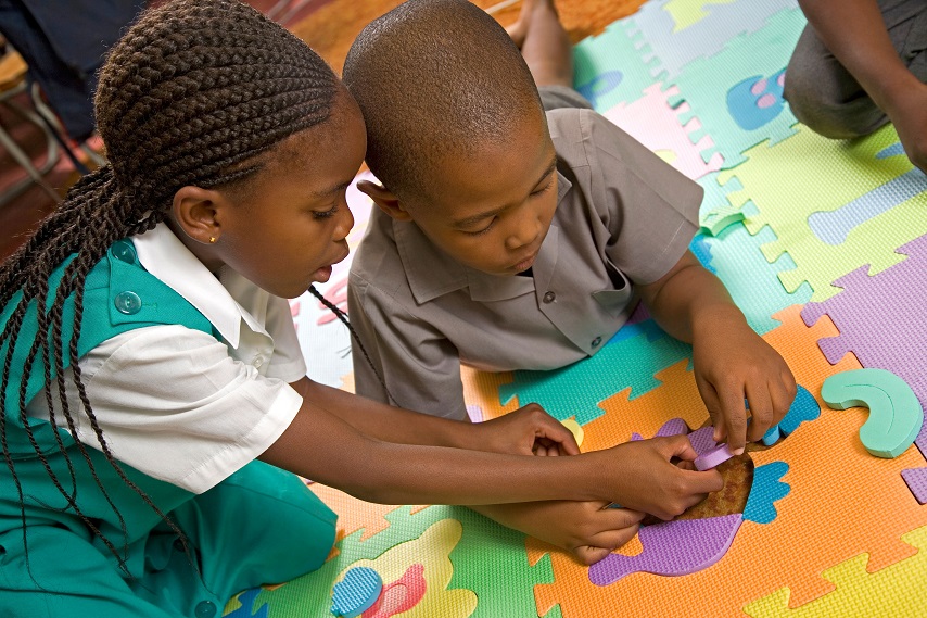 Children with puzzle