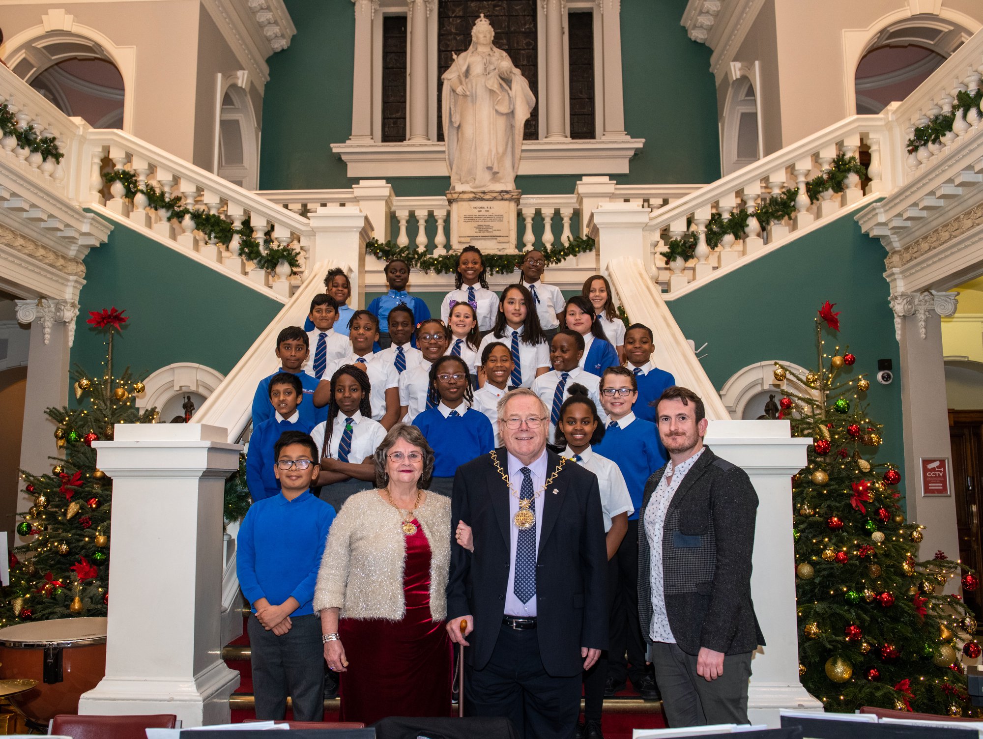 Mayor Cllr Mick Hayes pictured with his wife and Bannockburn Primary School Choir