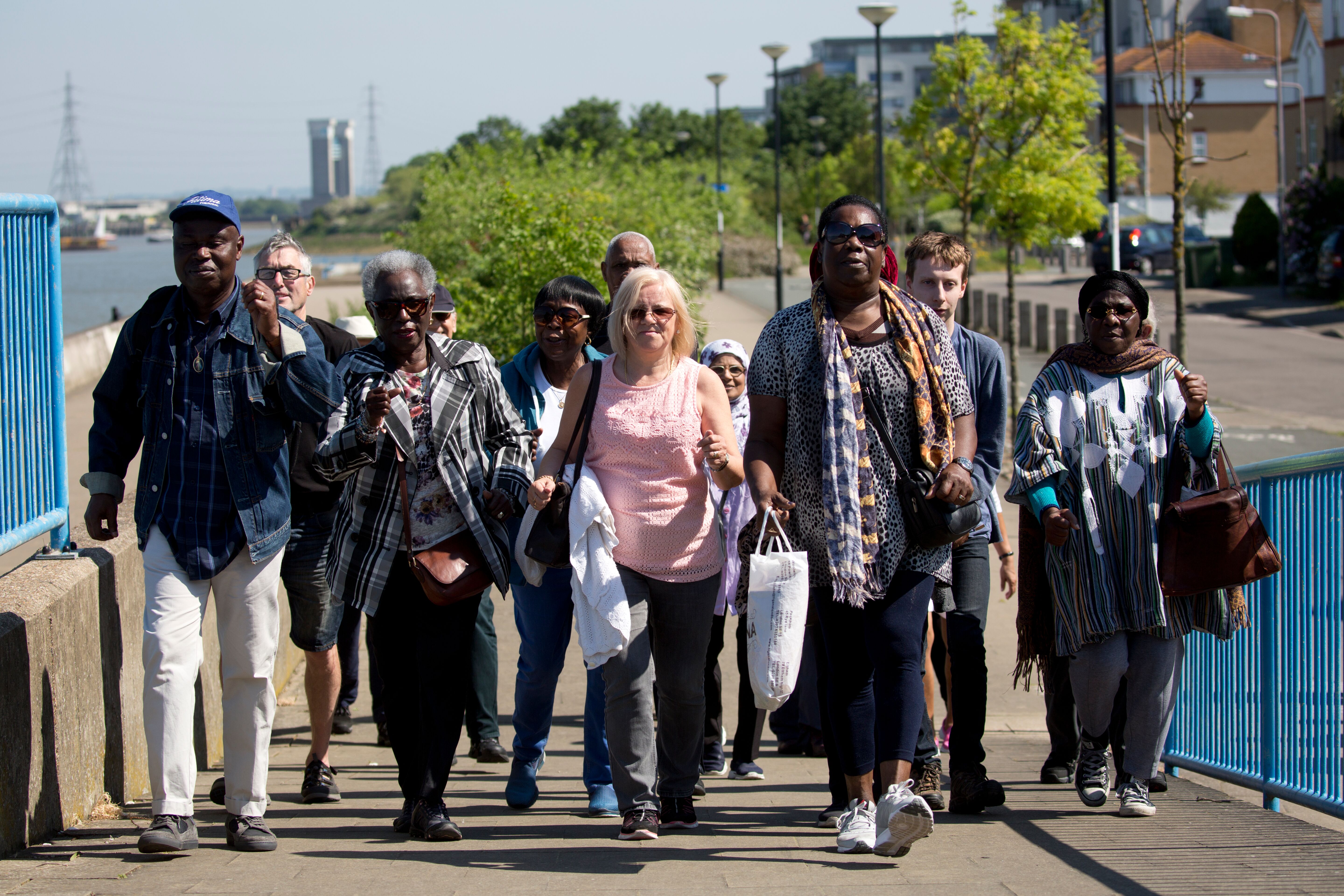 Group walking along the Thames