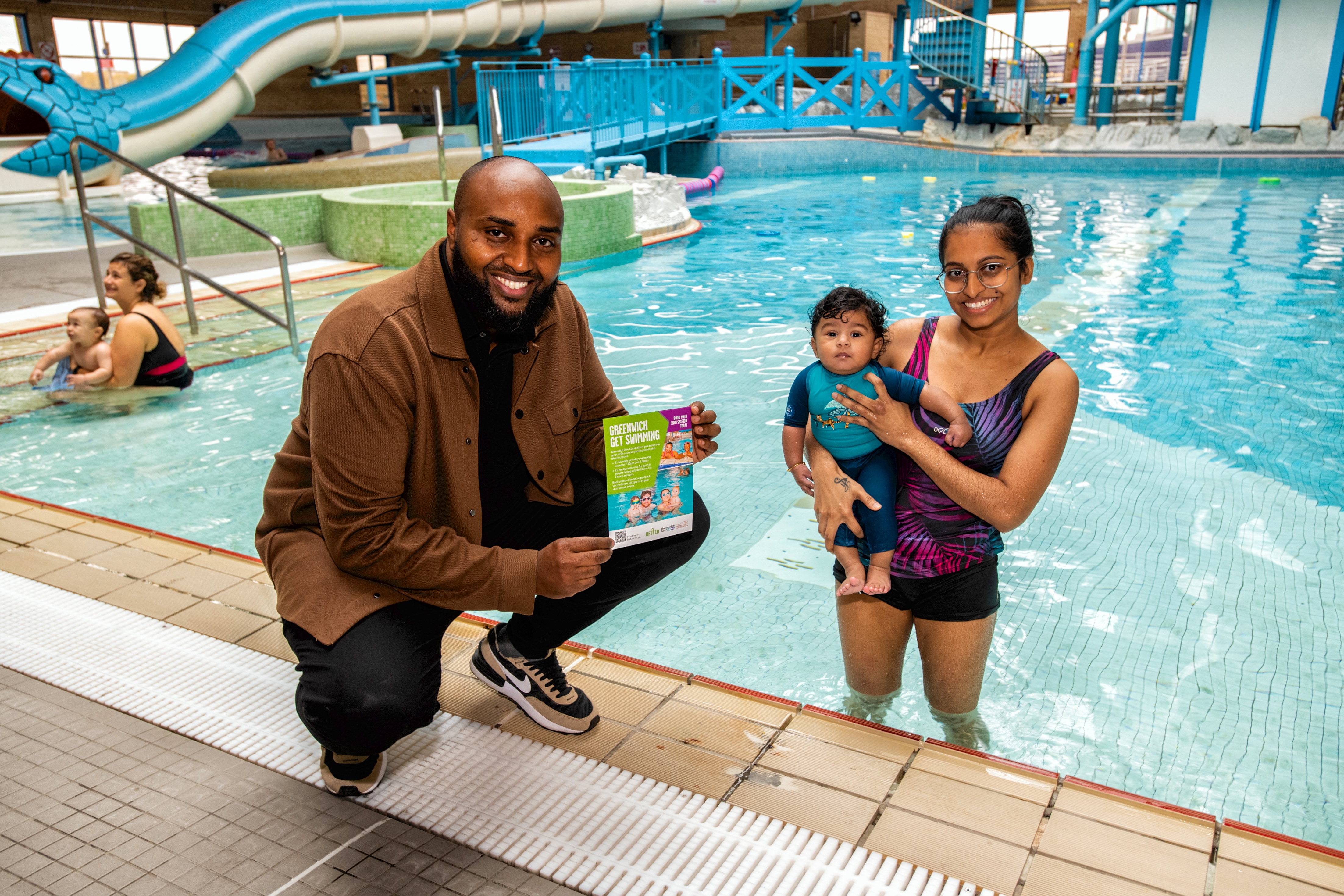 Cllr Adel Khaireh with Royal Greenwich mother enjoying a swim session with her child.