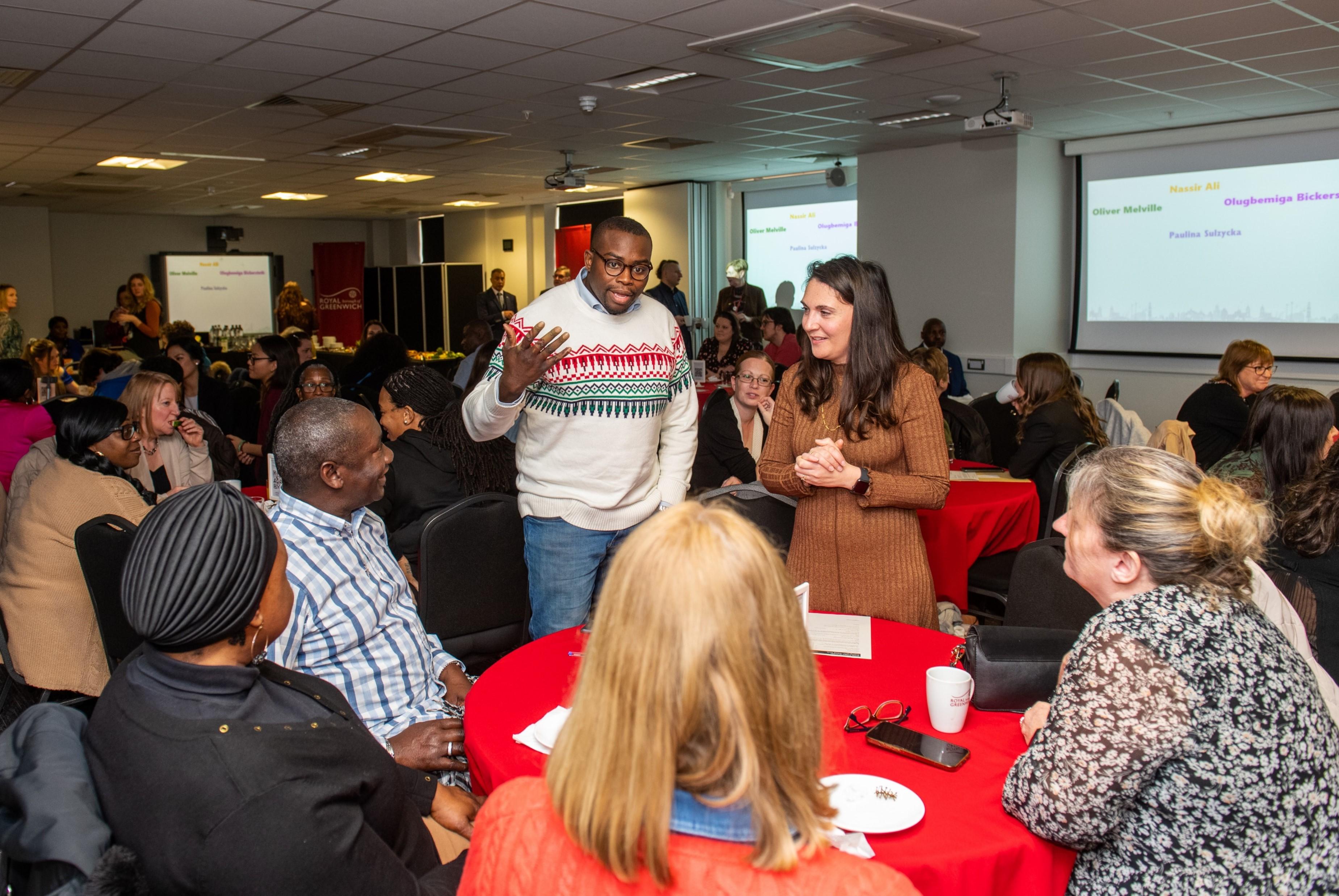 Senior Council leaders with Apprentices sitting at a table