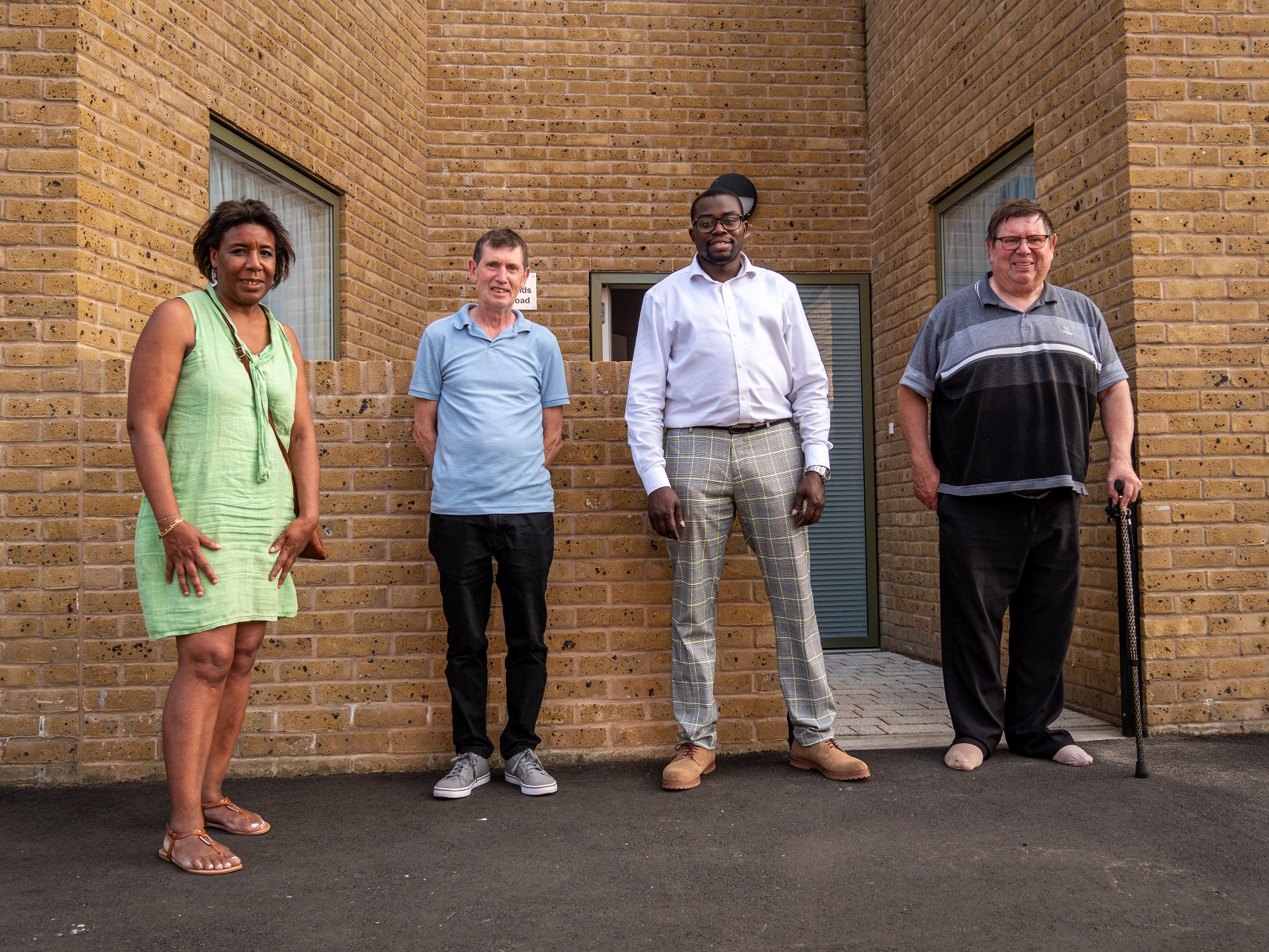 Deputy Leader Councillor Denise Scott-McDonald, tenant Anthony, Member for Housing Councillor Anthony Okereke and tenant Martin