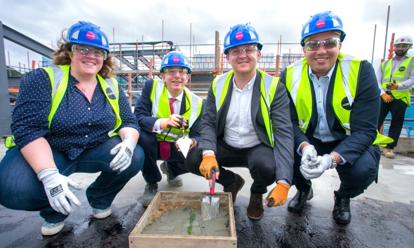 Plumstead Library topping out leader with cabinet members and andrew osborne