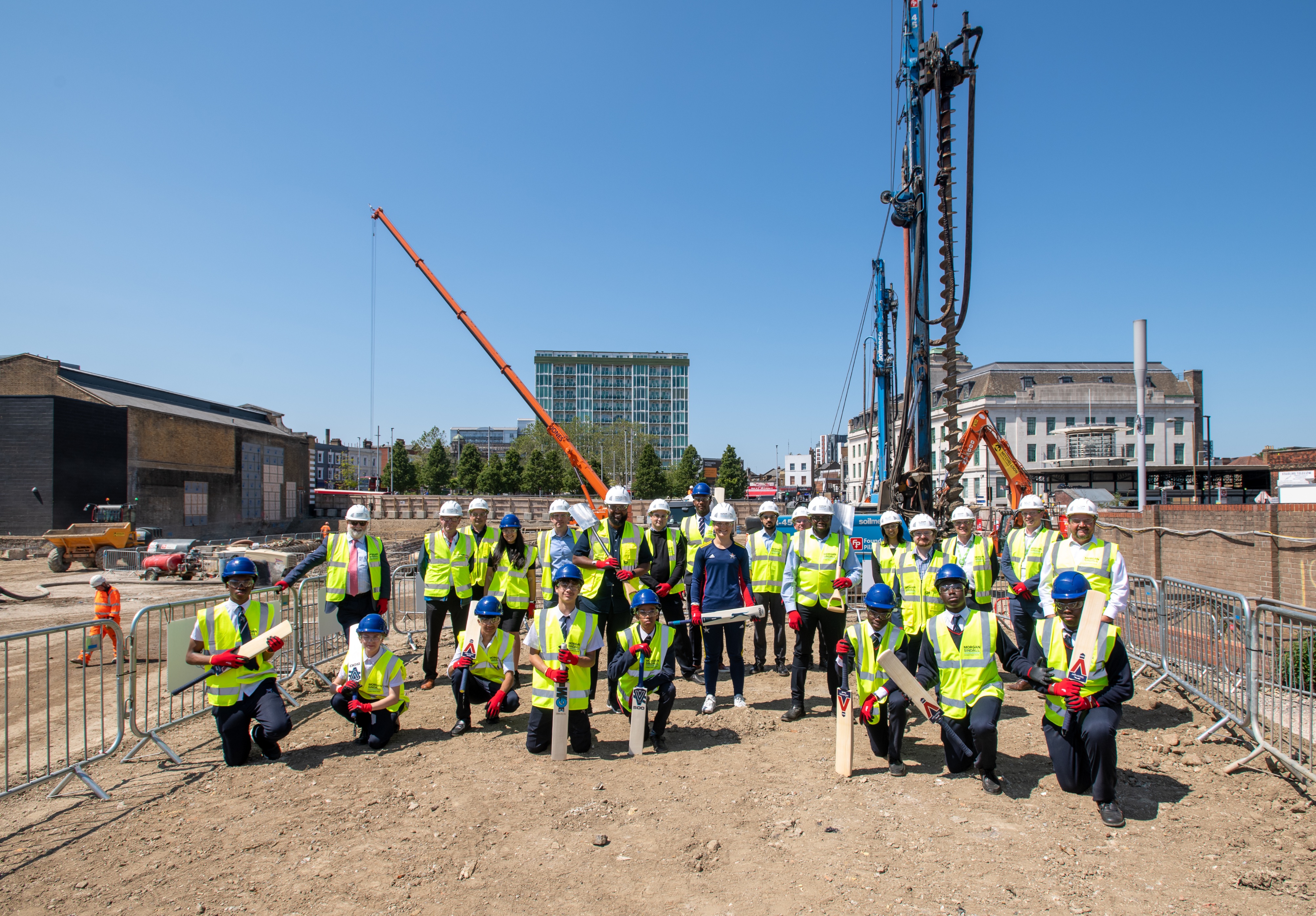 Royal Greenwich Cllrs celebrate the start of construction work with pupils from Plumstead Manor School and professional cricketer Phoebe Franklin.