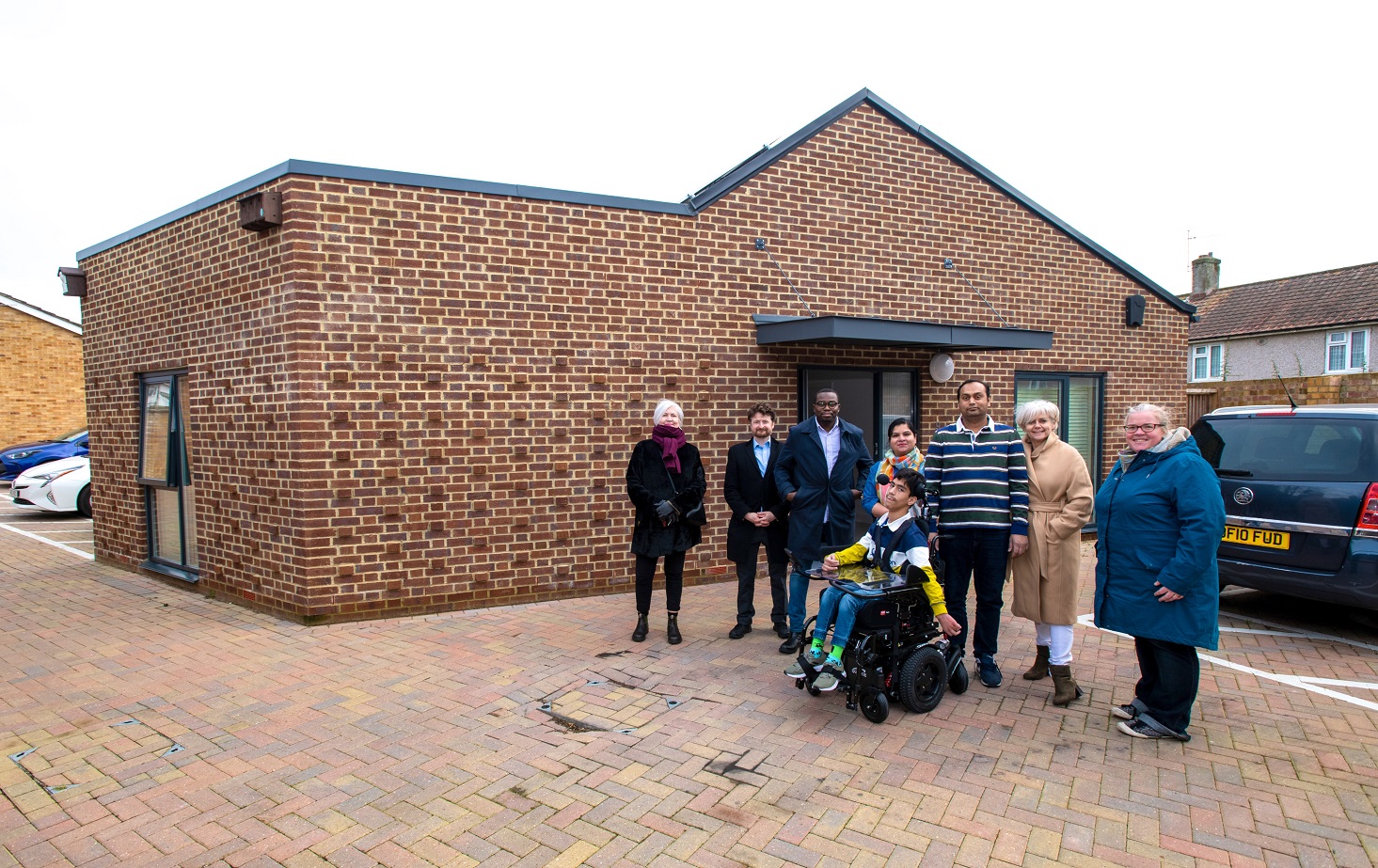 Councillors and tenants at a new wheelchair-accessible council home in Eltham.