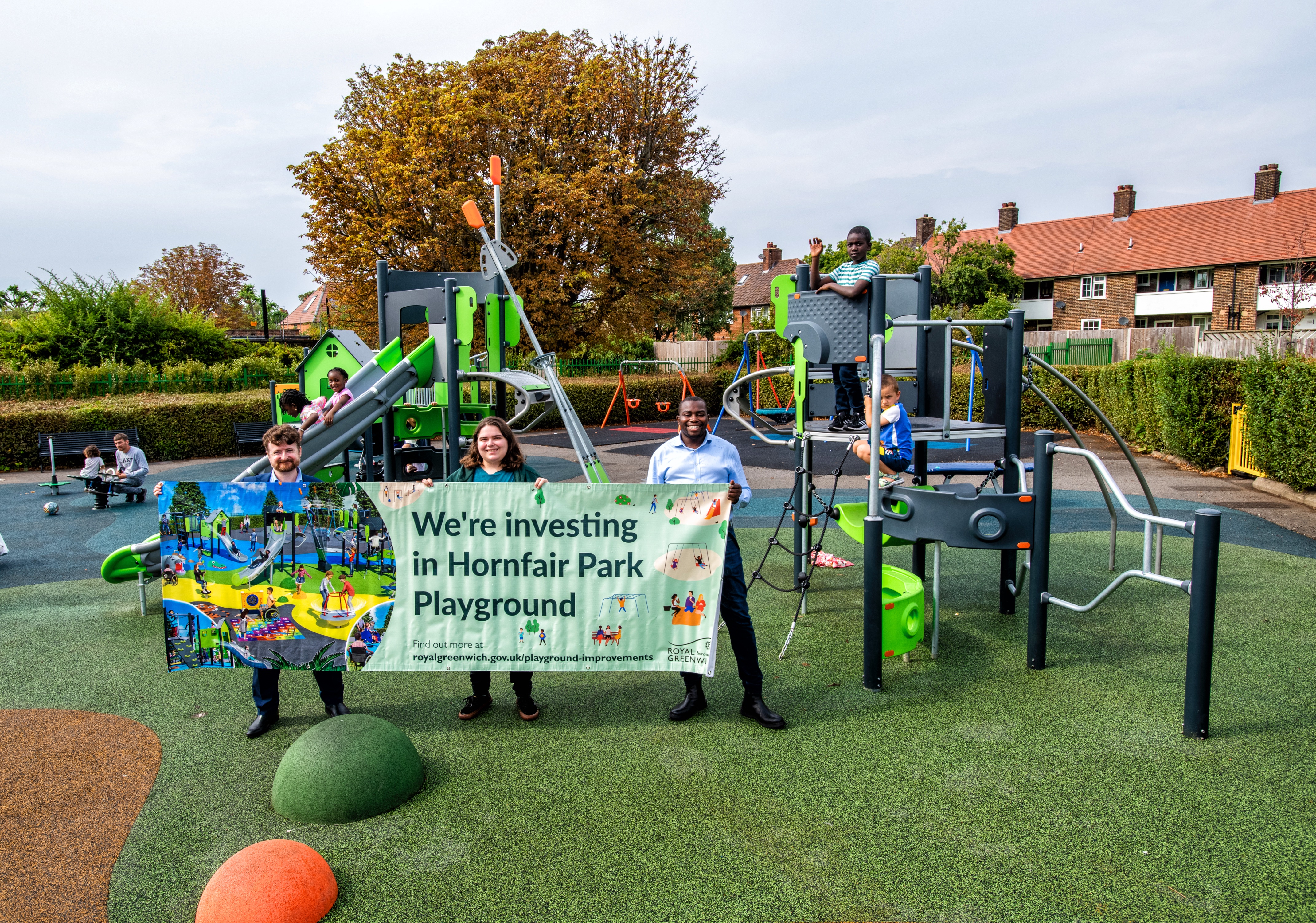 Cllrs Okereke, Smith and Burke-McDonald stand in front of the new climbing frame in Hornfair Park playground