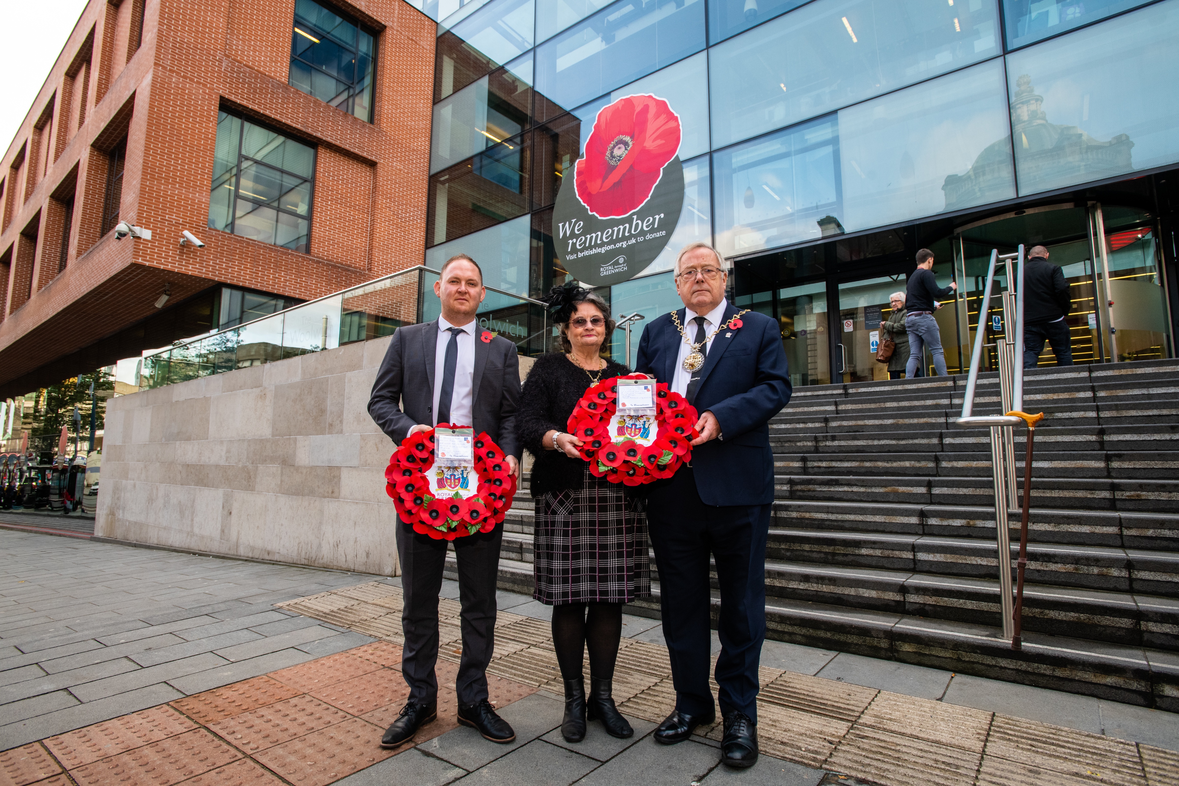 Cllr Thopre, the Mayor and Mayoress of Royal Greenwich hold two minutes silence.