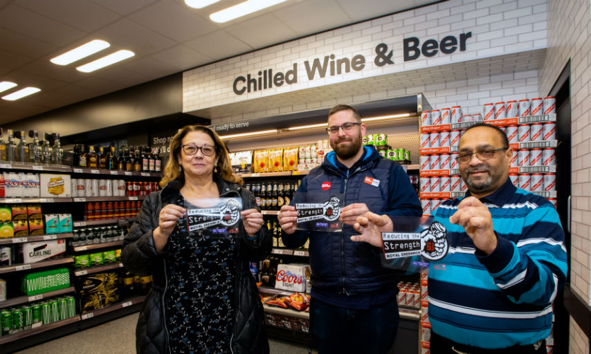 Cllr Jackie Smith, Andy Hergest, store manager of the food WAREHOUSE and Jay Patel, owner of Townsend Newsagents support the Reducing the Strength campaign