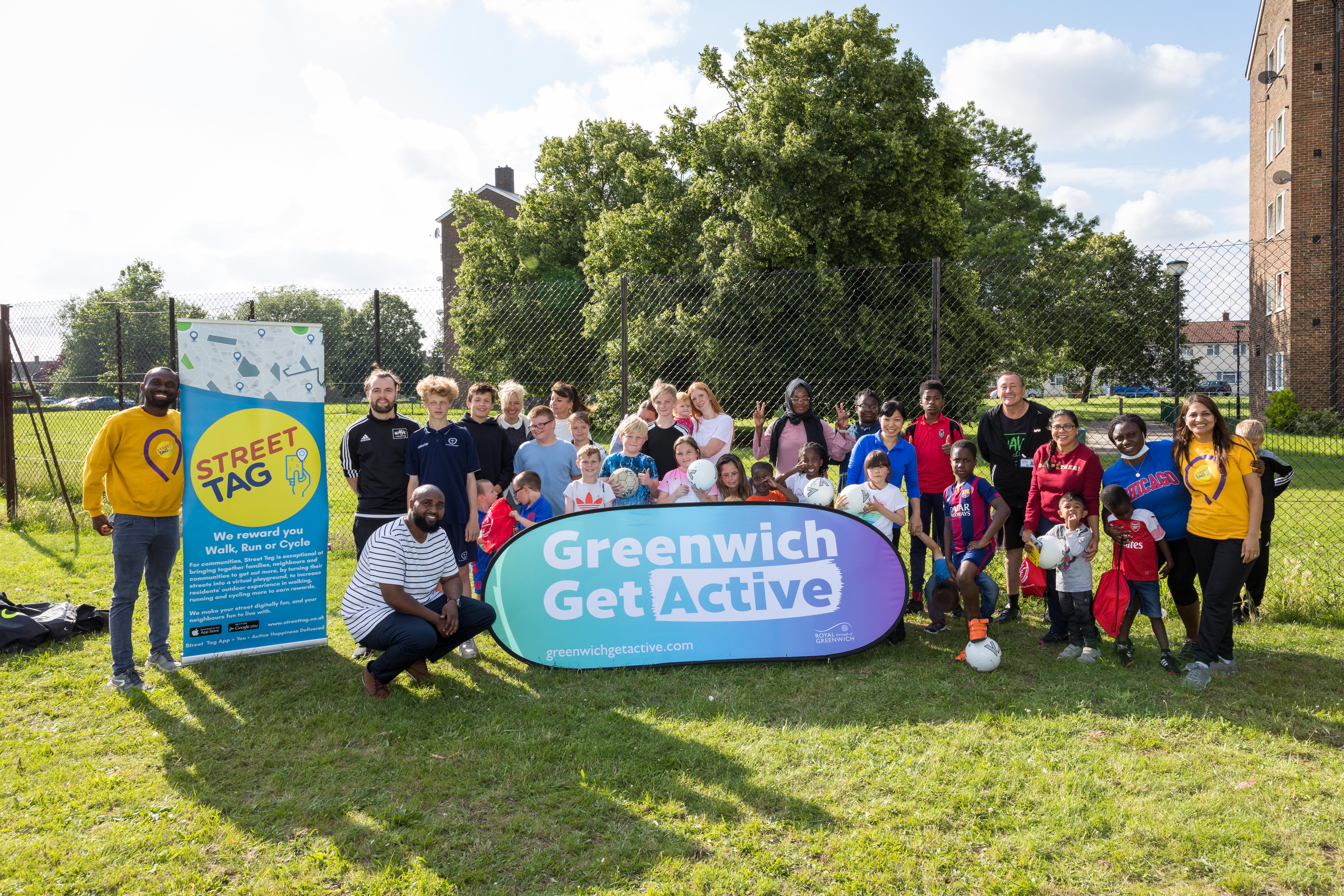 Seun oshinaike from street tag far left cllr adel khaireh and families at the launch of the council s new street tag app