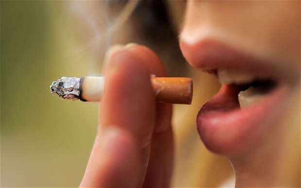 Young girl smoking