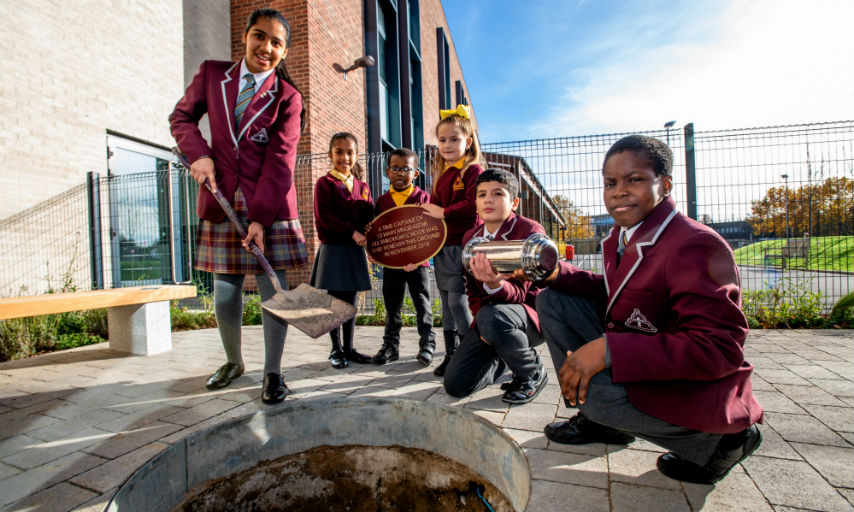 Pupils from St Mary Magdalene CofE school get ready to bury the time capsule