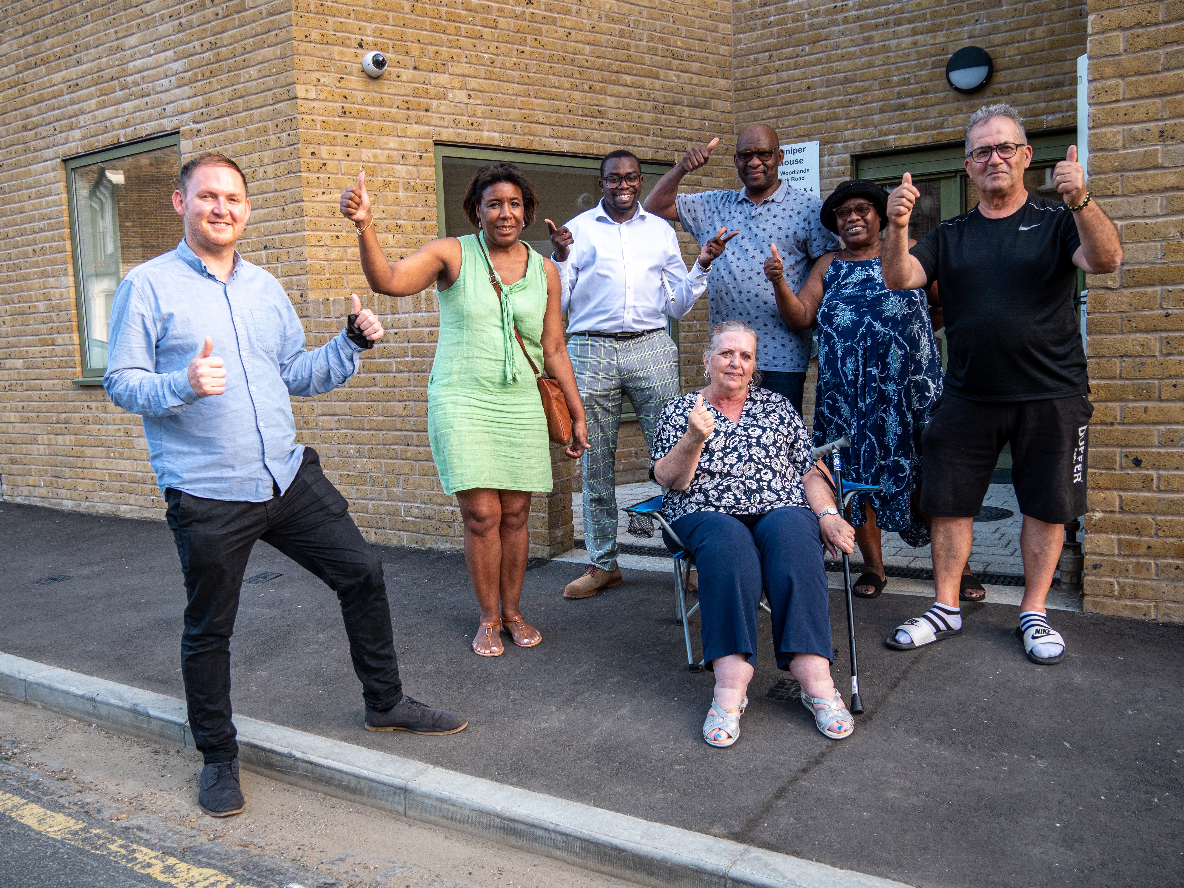 Members of Royal Greenwich Cabinet pose with tenants at a new over 55s council home development in Greenwich Peninsula.