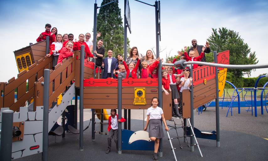 Pupils enjoying the new playground in Winn's Common