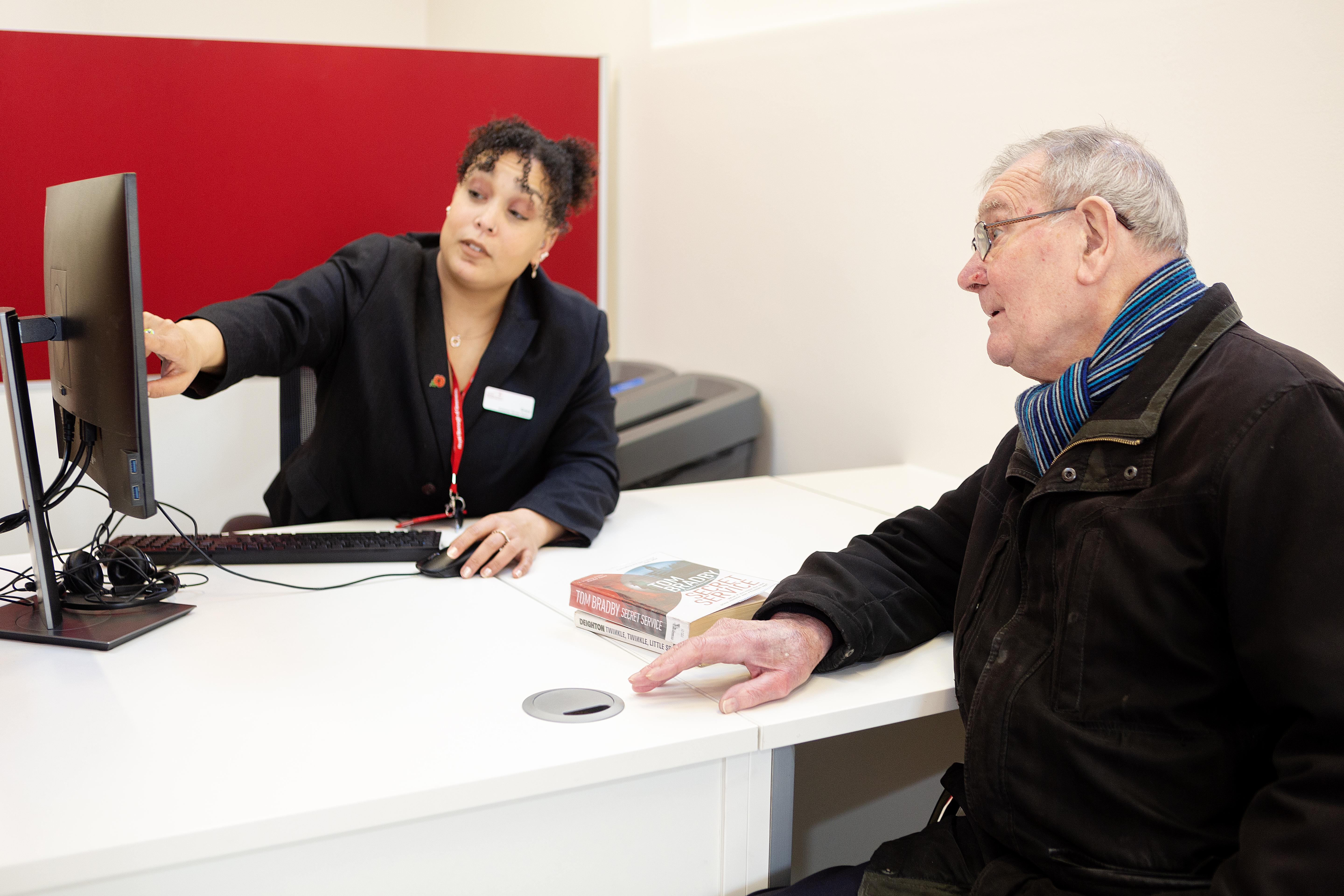 Resident at Eltham Centre, speaking to a member of the Customer Service team.