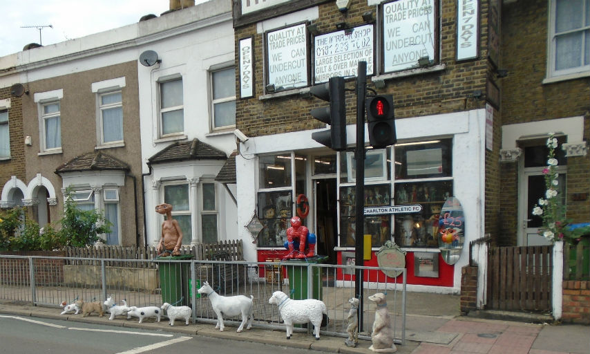 Items like full length mirrors, large animal sculptures and superhero figurines on display outside the Mirror Shop on Woolwich Road