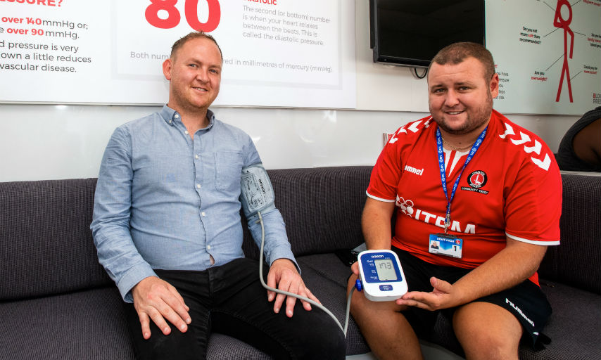 Cllr Danny Thorpe, Leader of the Royal Borough of Greenwich receiving blood pressure check in Woolwich