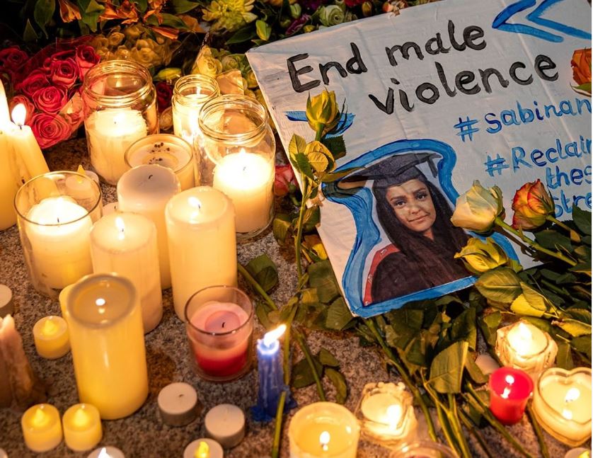 Image of candles and placard at Sabina Nessa's vigil.