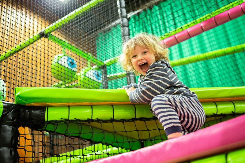 Child in soft play area