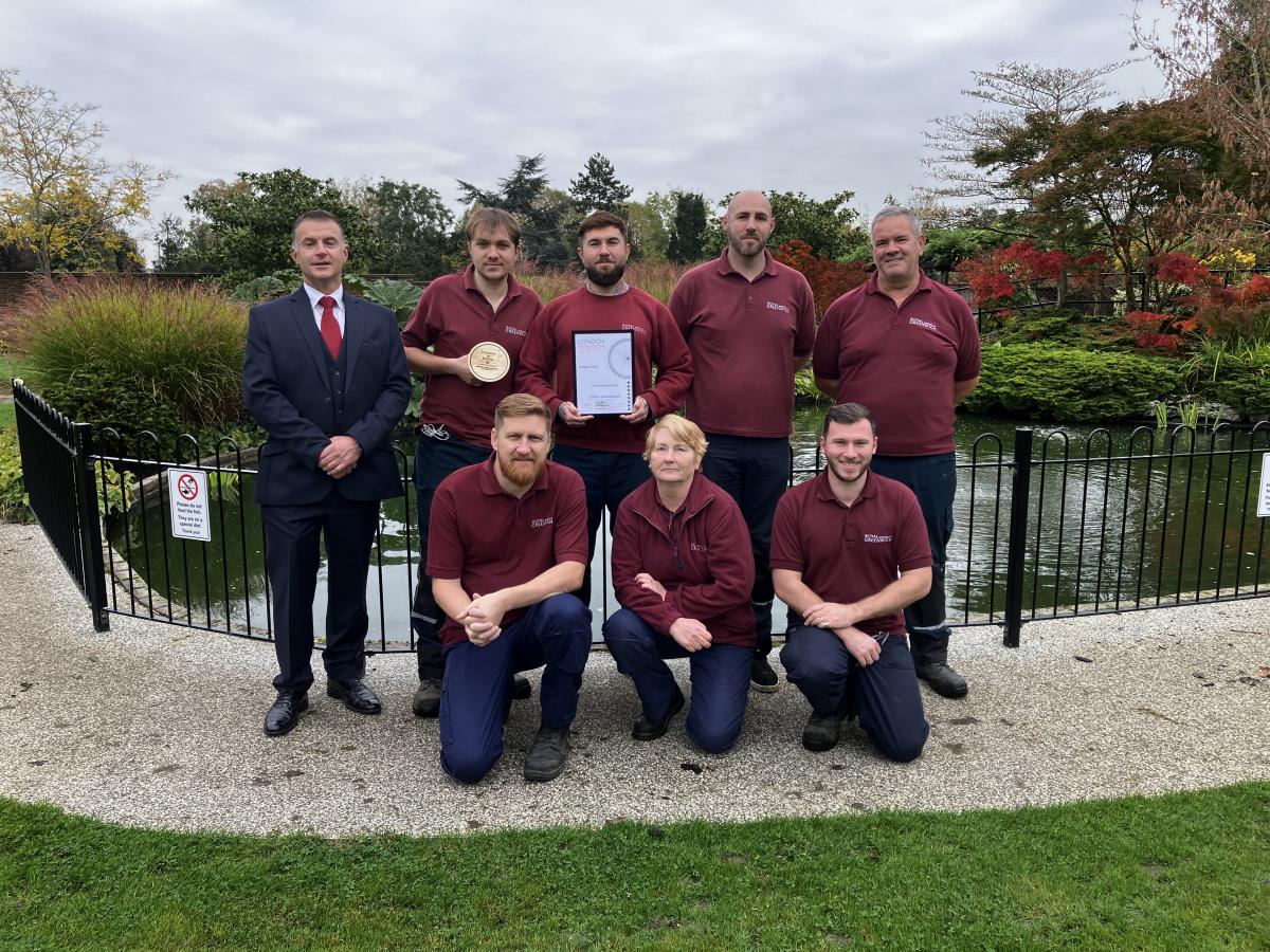 Parks team holding up award