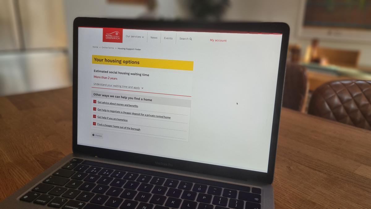 A webpage is open on a laptop, indicating the user's likely wait for social housing is more than 2 years. The pages lists other options including: Get advice about money and benefits, Get help to negotiate a cheaper deposit, Get help if you're homeless and Find a cheaper home out of the borough