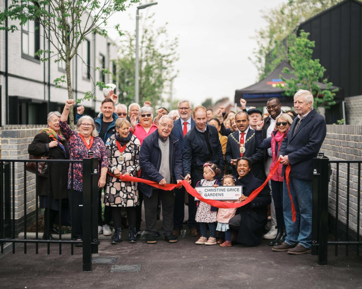 Photo of Councillor Grice's family, Mayor of Greenwich Cllr Jit Ranabhat, Leader of the Council Cllr Anthony Okereke, MP Clive Efford and councillors past and present cutting a ribbon to open Christine Grice Gardens