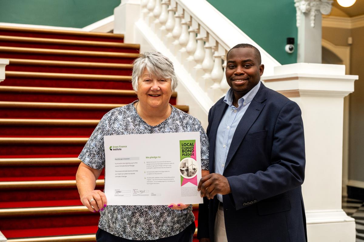 Councillor Denise Hyland and Councillor Anthony Okereke holding llimate pledge certificate