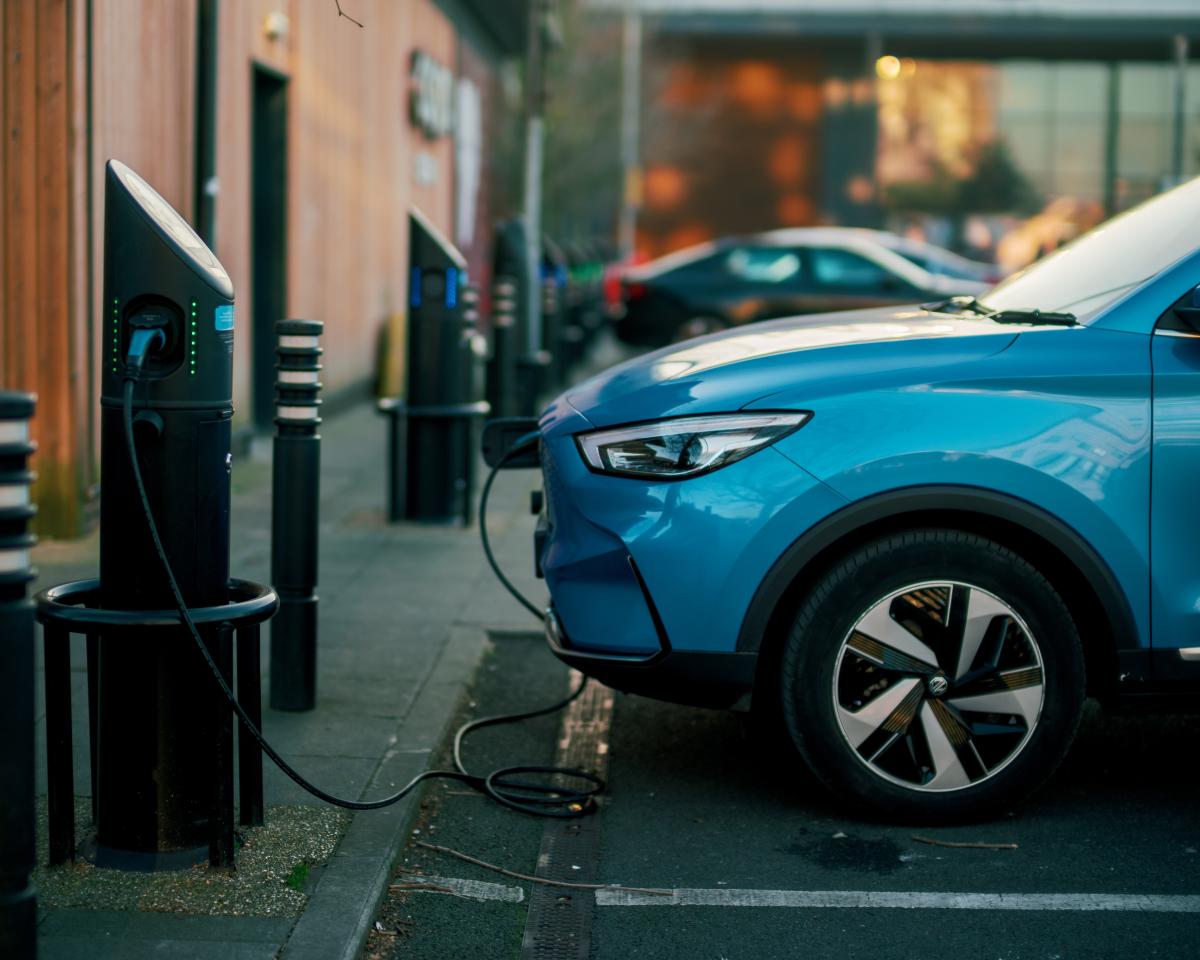An image of an electric vehicle being charged