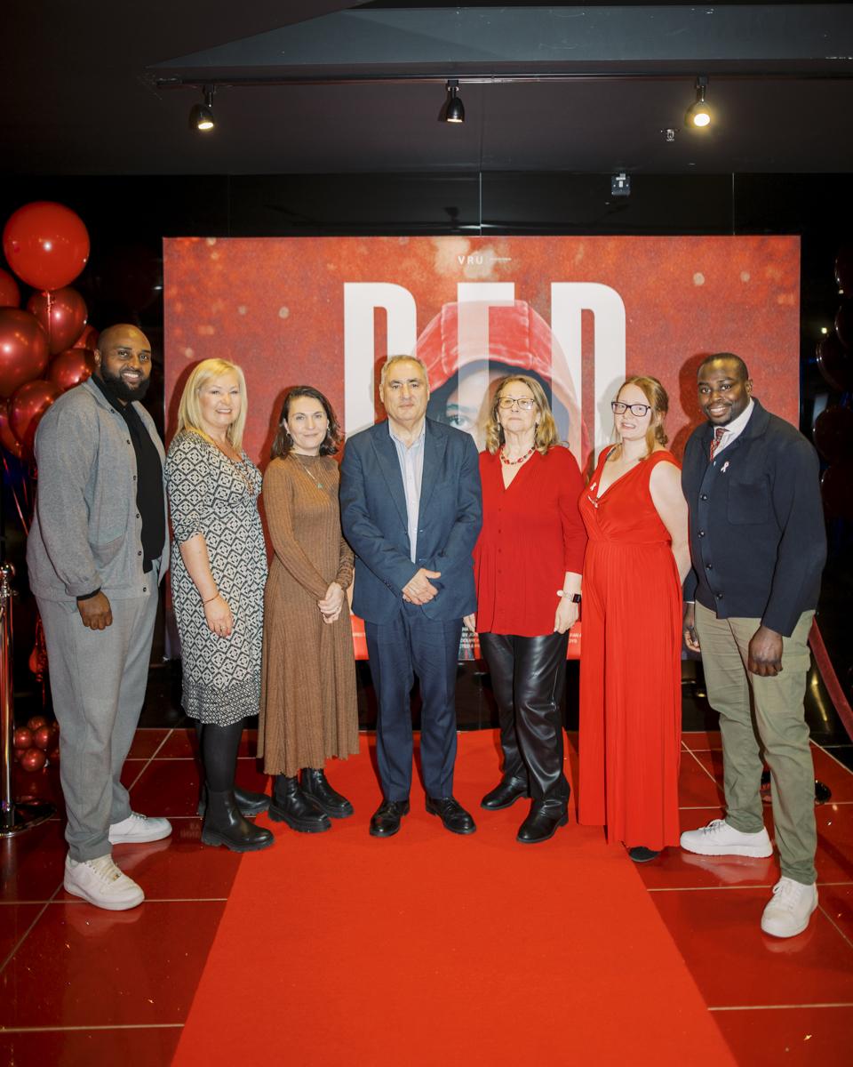 Cabinet members standing with Len Duvall 