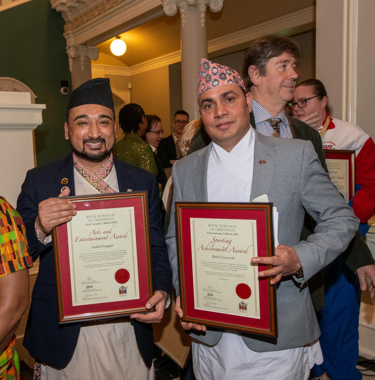 Civic Award winners showcasing their certificate