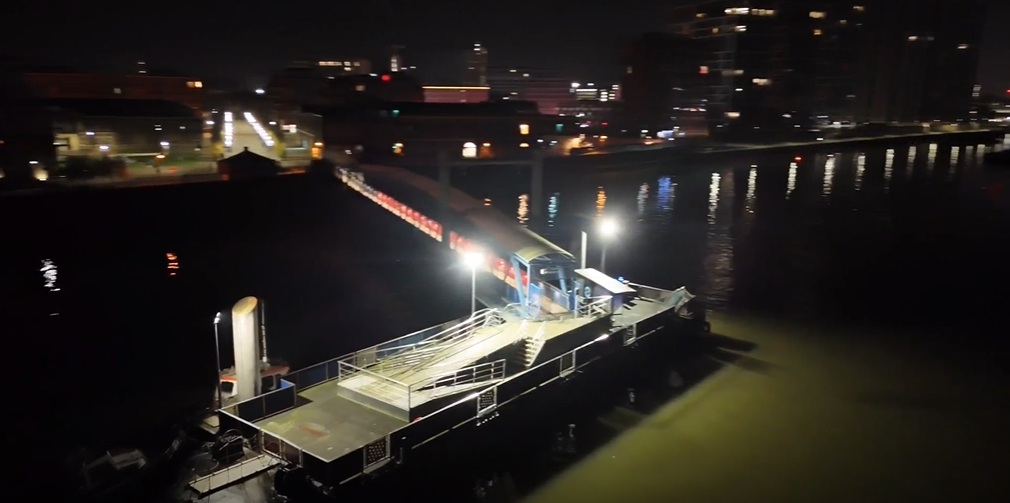 A drone picture taken at night of the Woolwich Arsenal Pier with new and improved lighting.