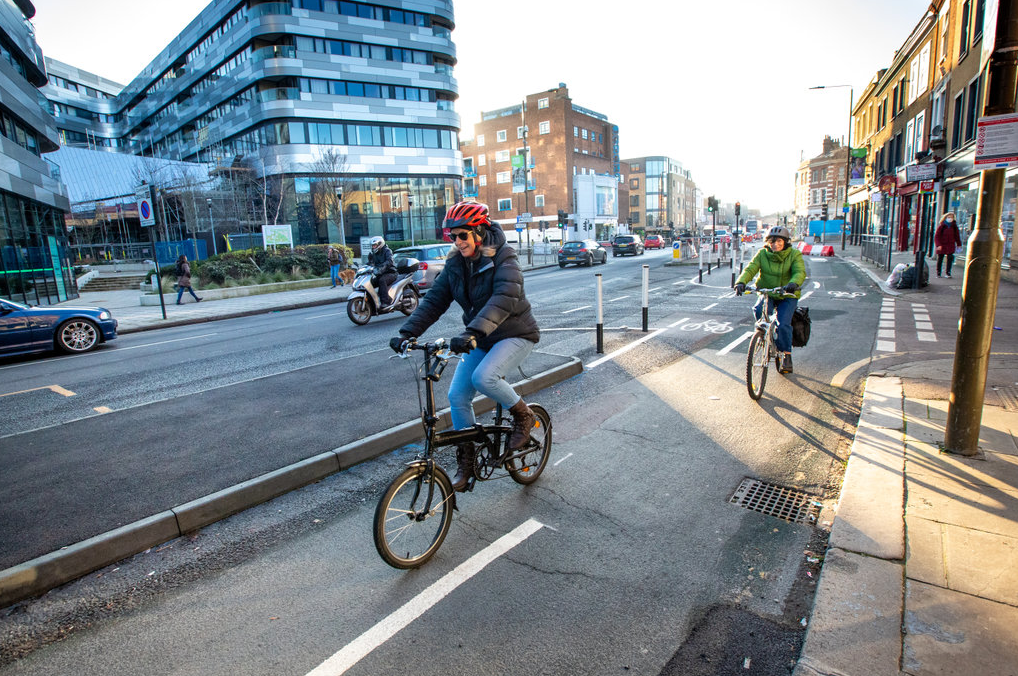 people cycling along main road in Greenwich 