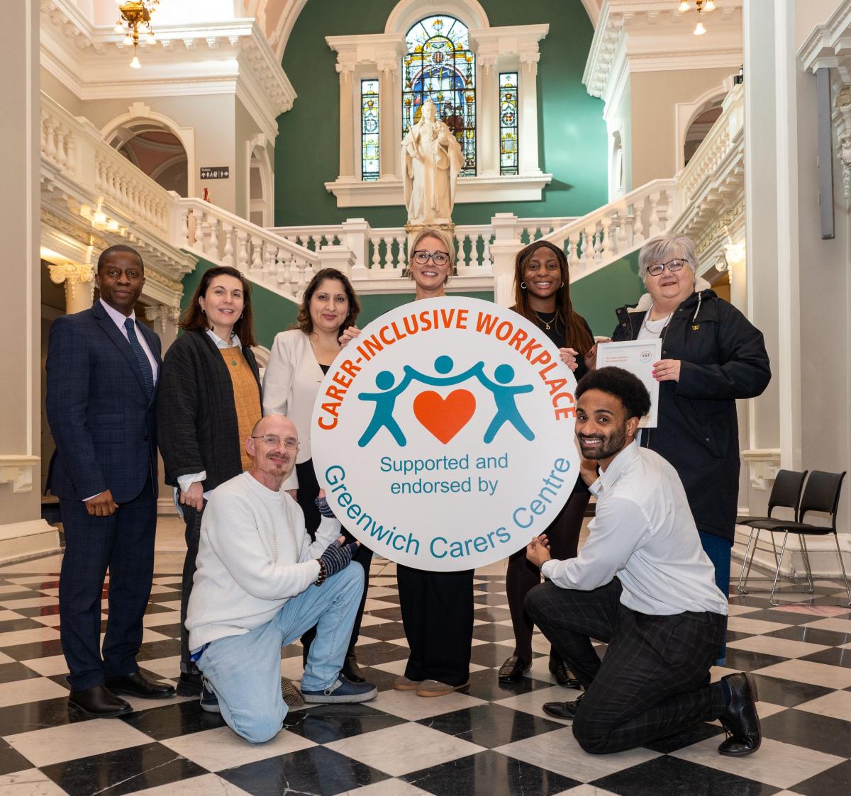Image showing Cllrs Lolavar and Hyland alongside representatives from Greenwich Carers Centre and the council's HR team.