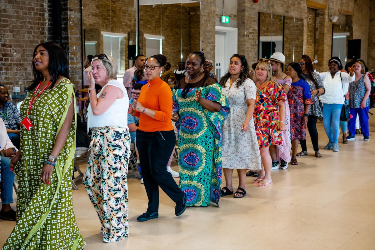 Image showing a conga line of carers