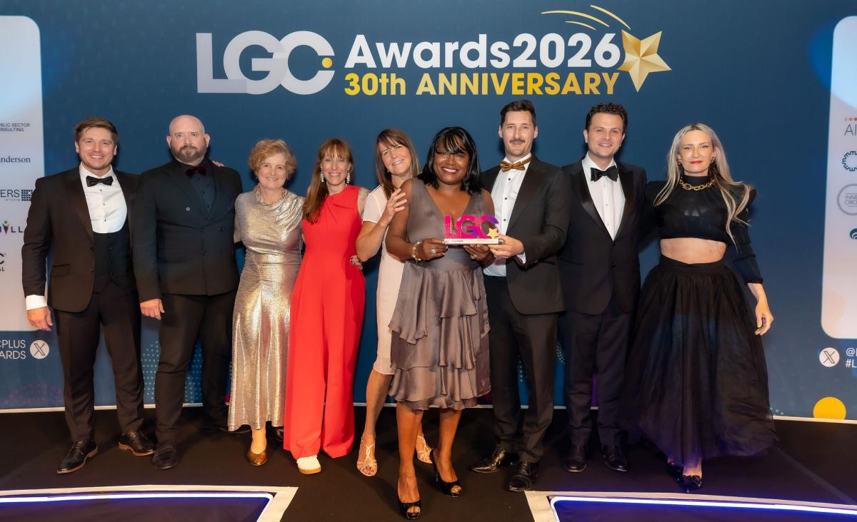 Image showing our Digital Health and Care Technology team accepting their award