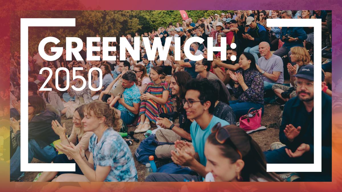 A crowd clapping with the words Greenwich 2050 written on it 