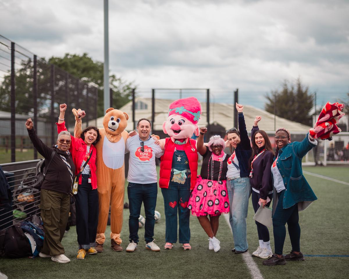 Foster care team, along with mascots at Foster Care Fornight football match at Long Lane JFC