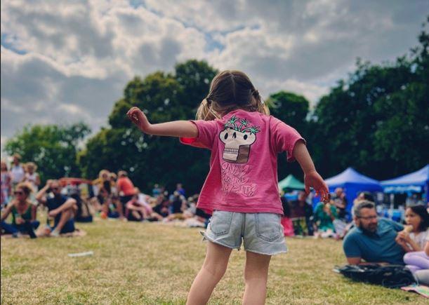 Young girl enjoying Parksfest event