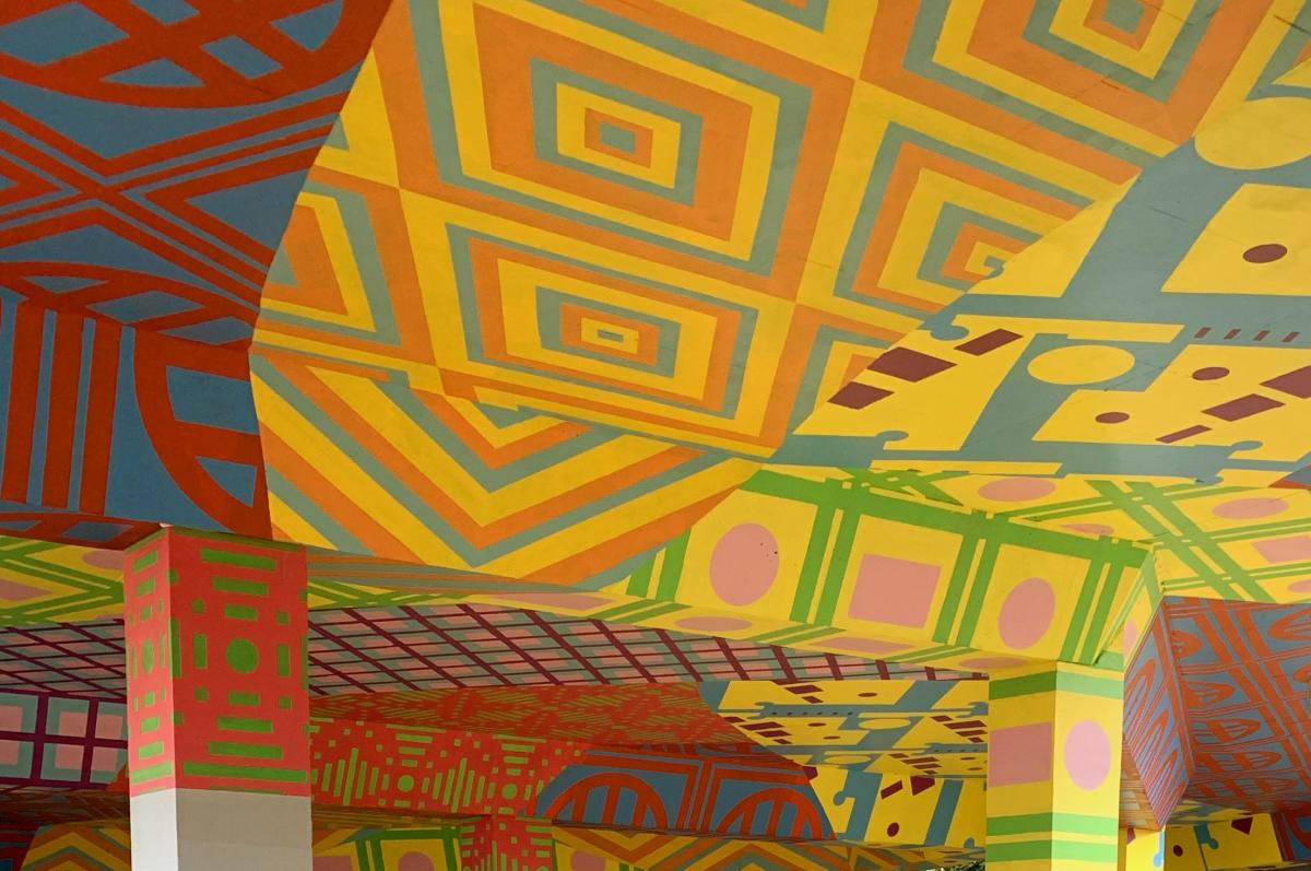 Ceiling mural of bright colours of The Colour Way underpass 