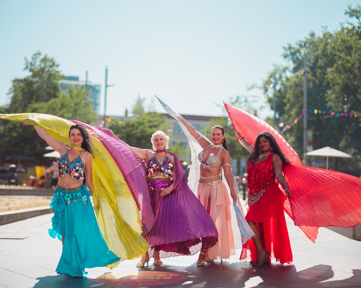 Woolwich Summer Lates performers wearing colourful outfits