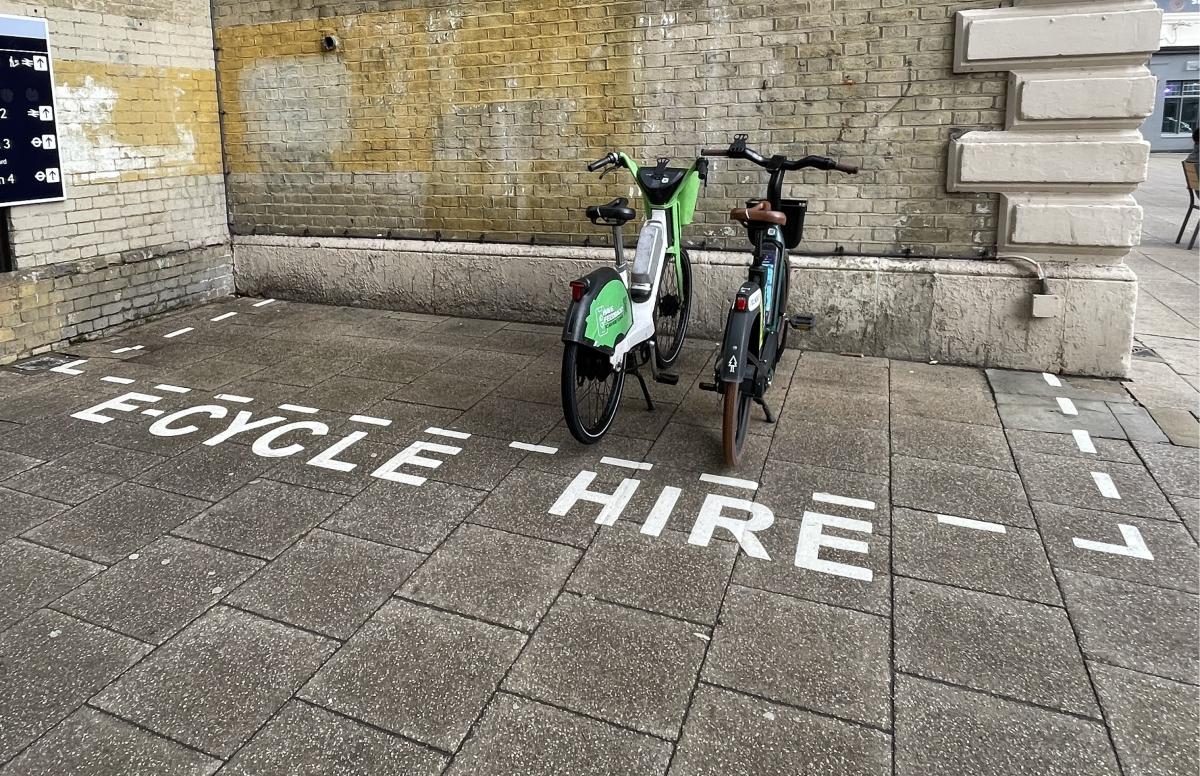 picture of a rental e-bike parking bay 