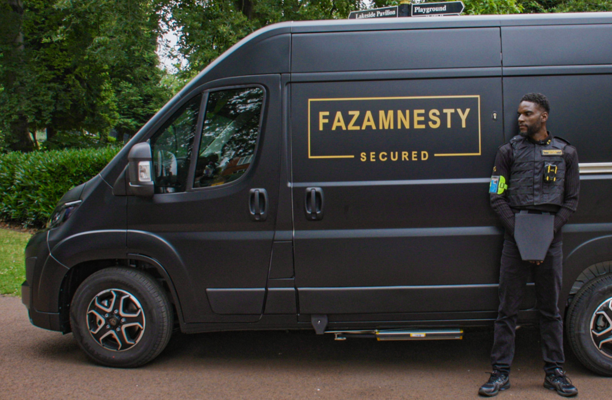 Photo of a man standing by a black FazAmnesty bin