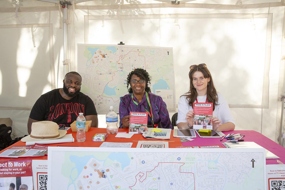John at a stall during the Thamesmead festival with members of the council team